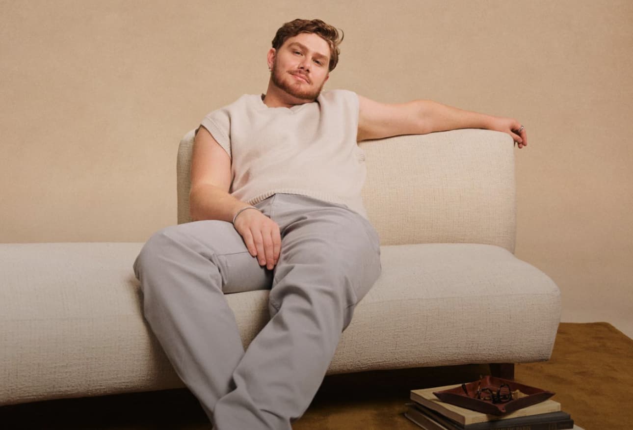 man relaxing head on hand